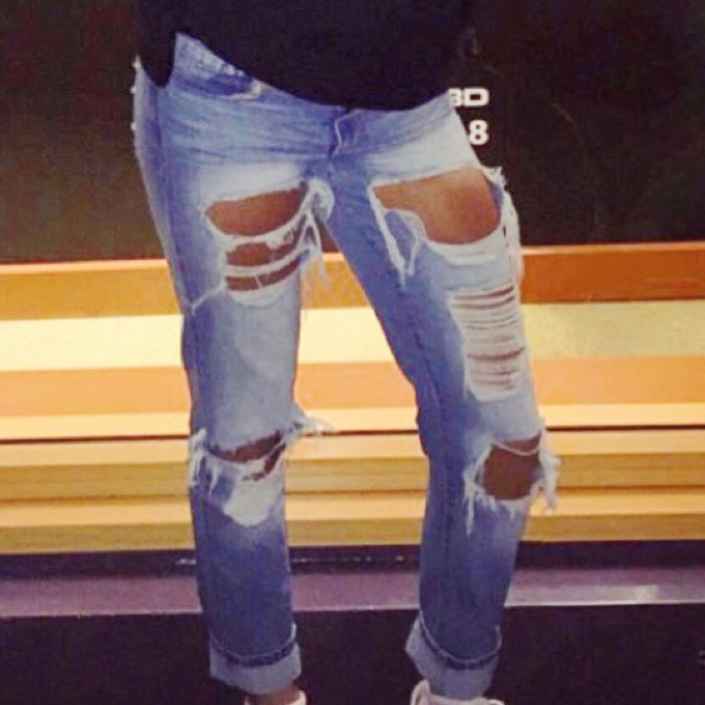Distressed denim jeans